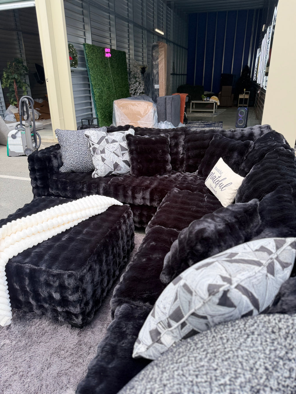 Waffle corduroy sectional in Black, styled view