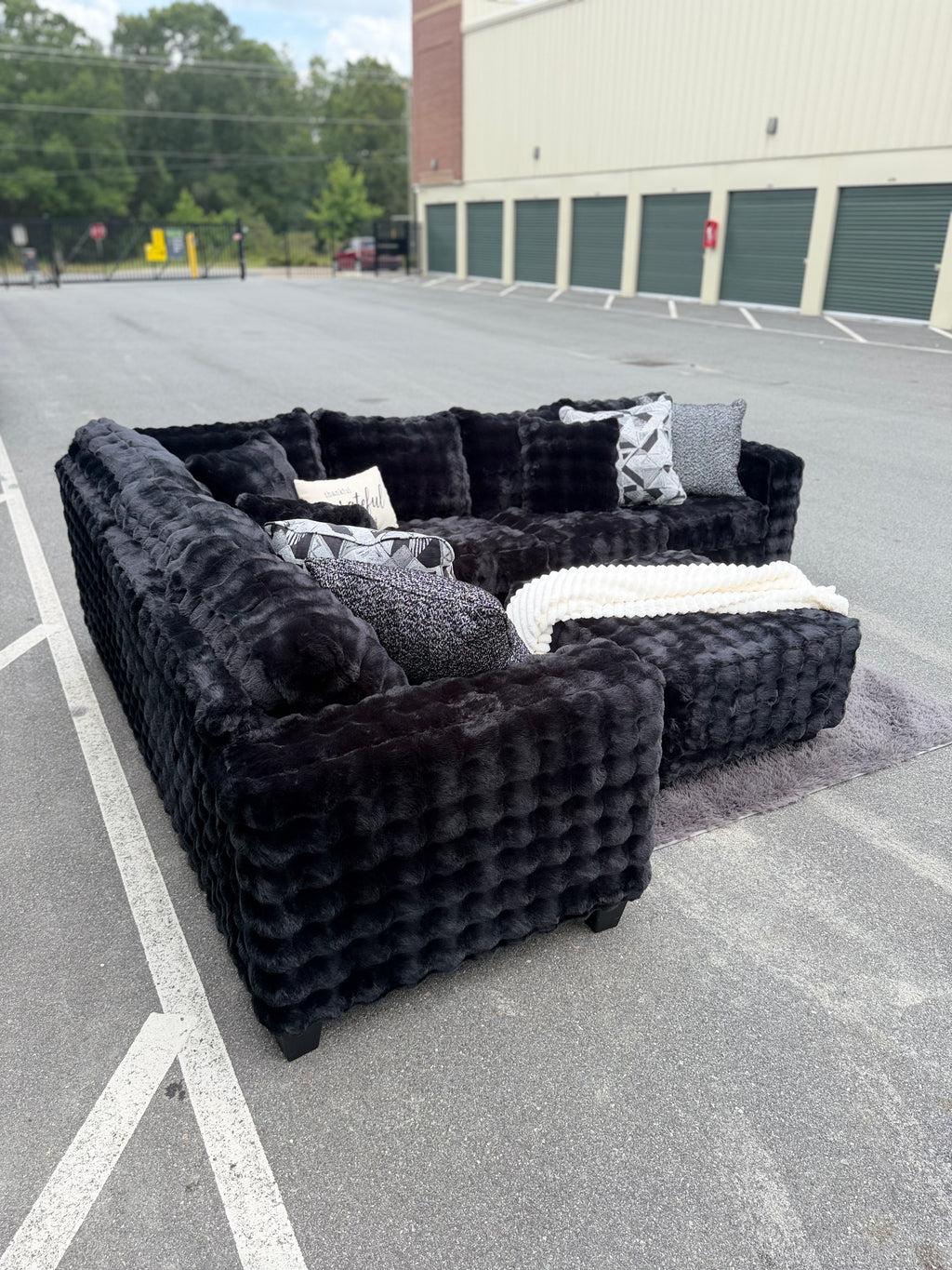 Waffle corduroy sectional in Black, angled view
