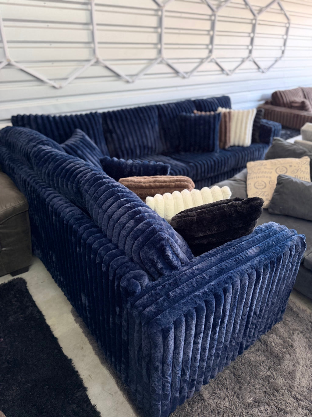 Upgraded corduroy sectional in Navy, arm detail