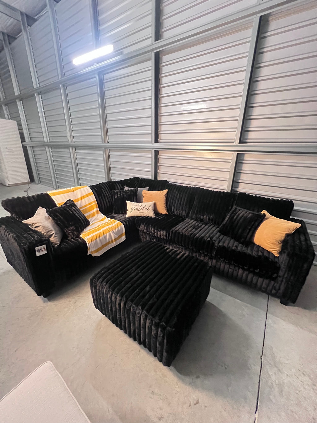 Upgraded corduroy sectional in Black, angled view
