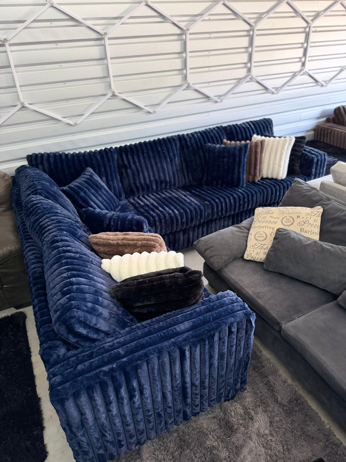 Upgraded corduroy sectional in Navy, side angle