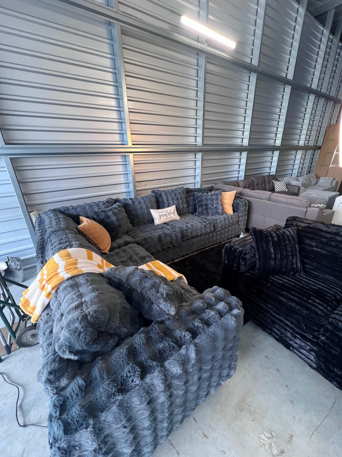 Waffle corduroy sectional in Grey, angled view