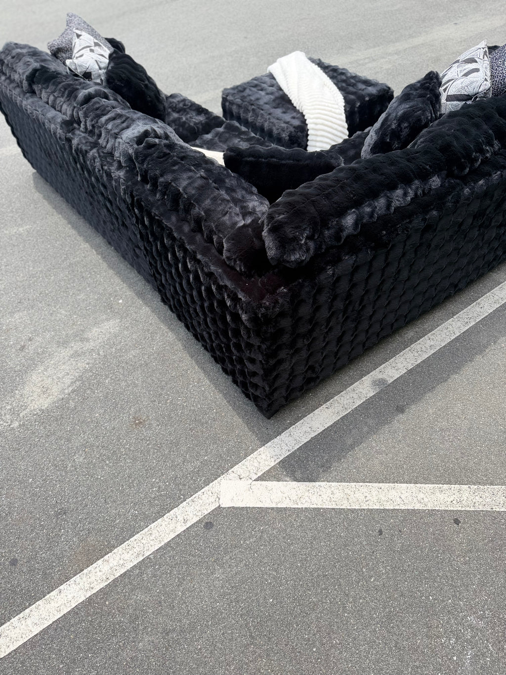 Waffle corduroy sectional in Black, side view