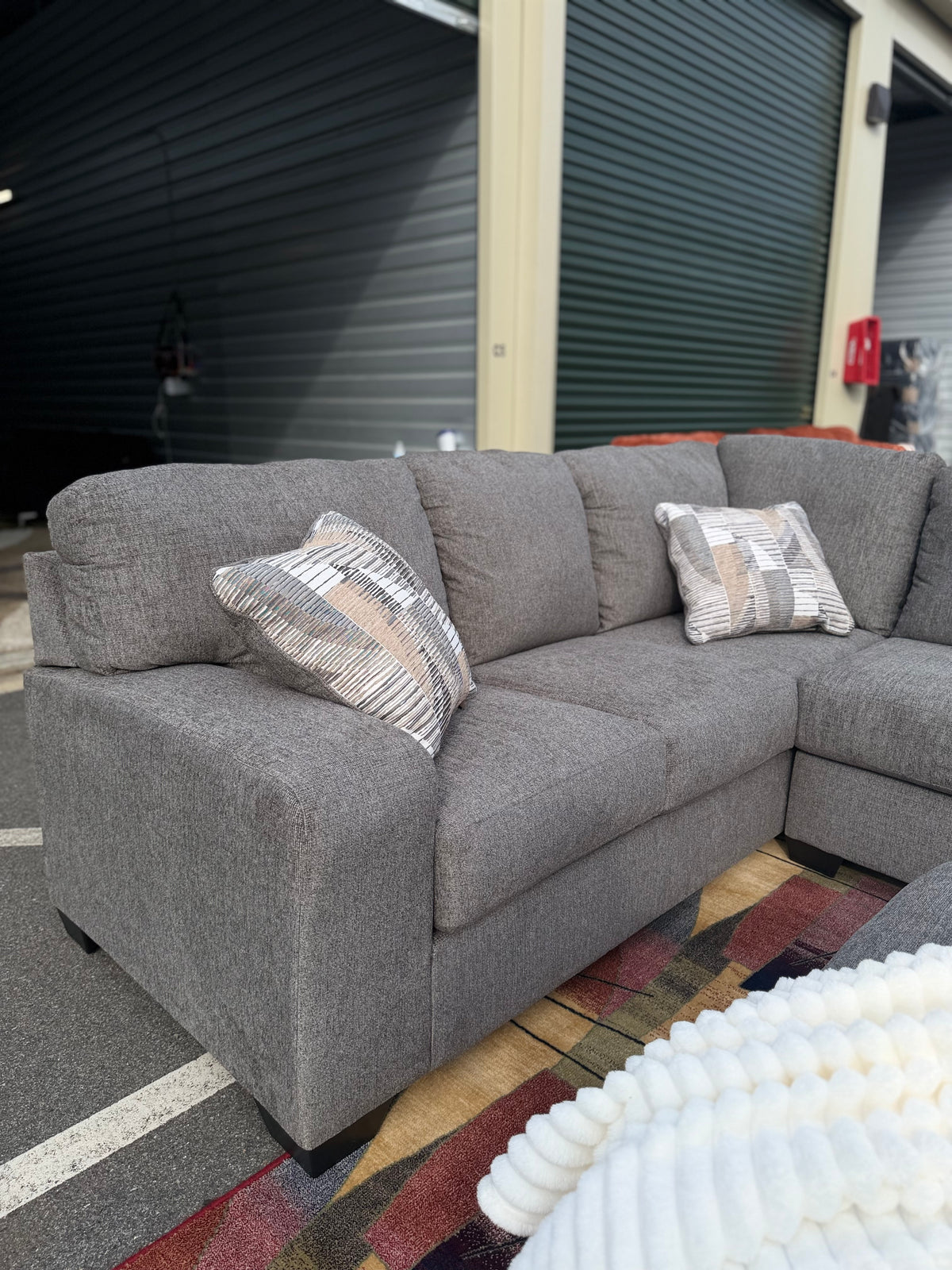 Ashley Newellen sectional, right chaise, arm view