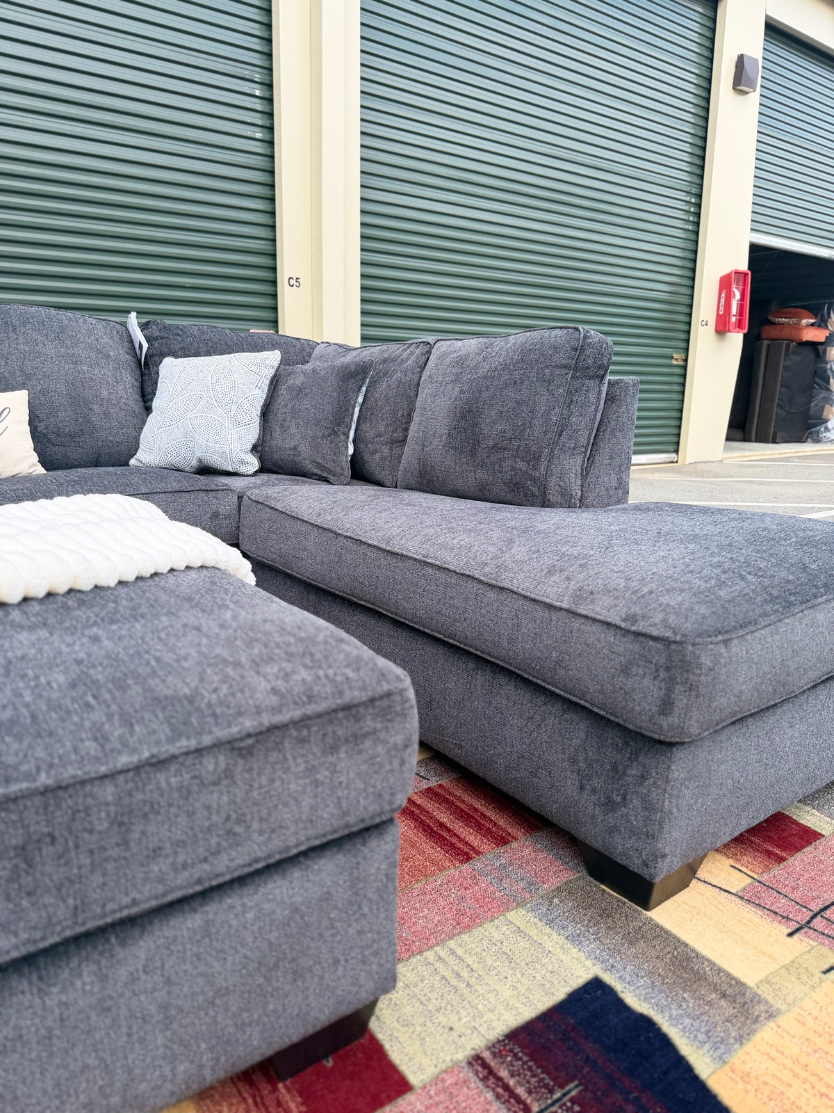 Ashley Altari sectional in Slate, right chaise, angled view