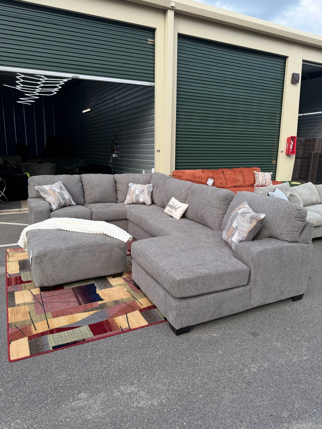 Ashley Newellen sectional, right chaise, with ottoman