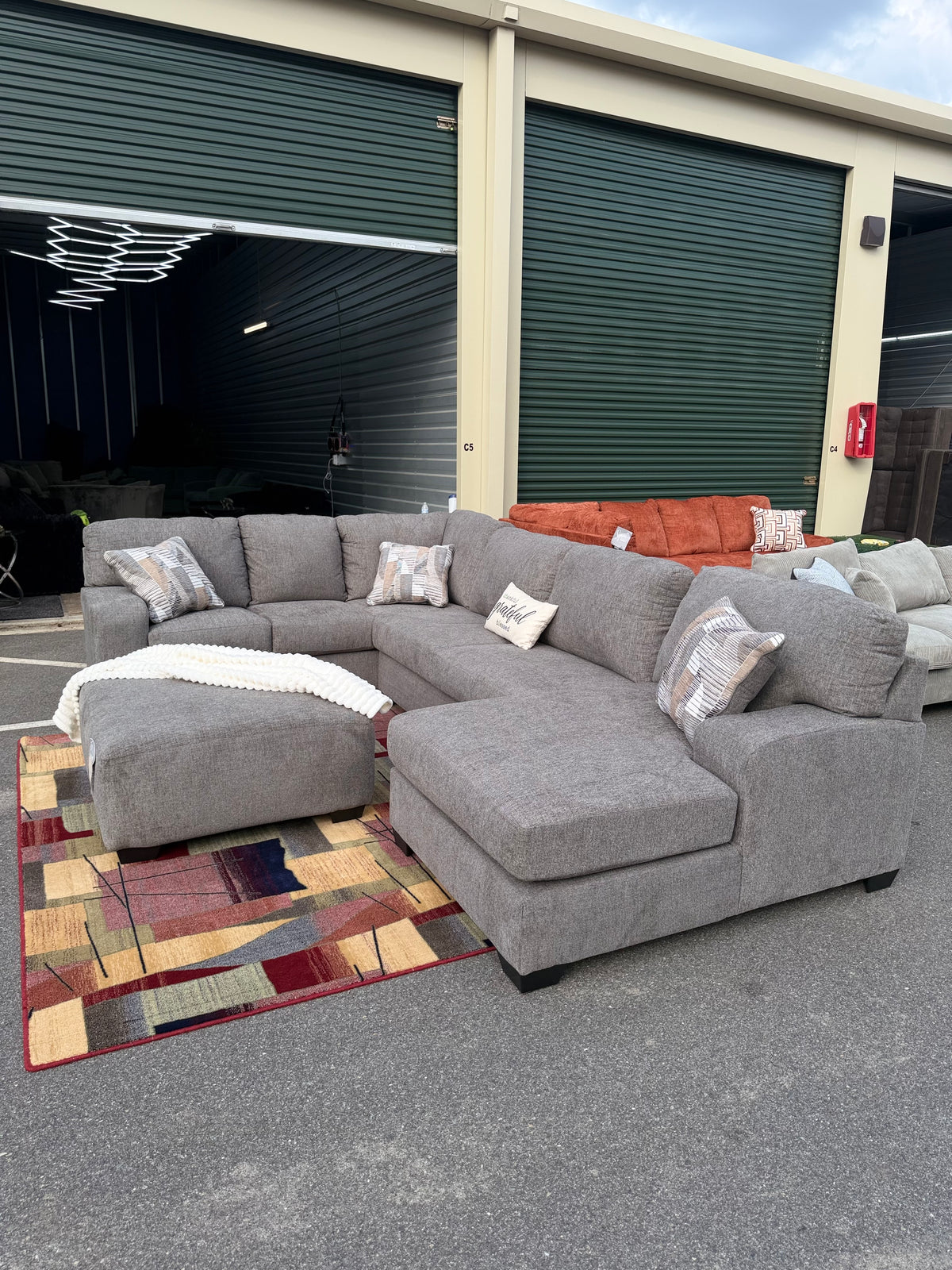 Ashley Newellen sectional, right chaise, with ottoman