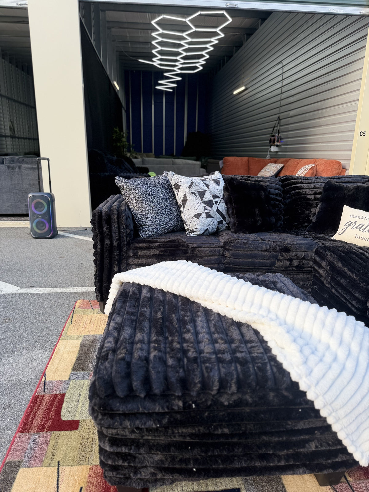 Black corduroy sectional close-up texture