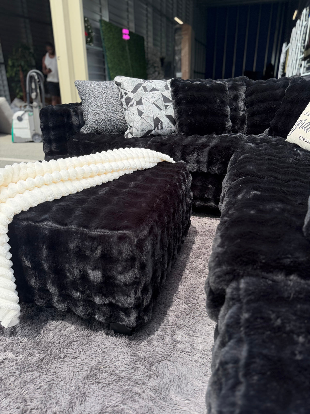 Waffle corduroy sectional in Black, with ottoman