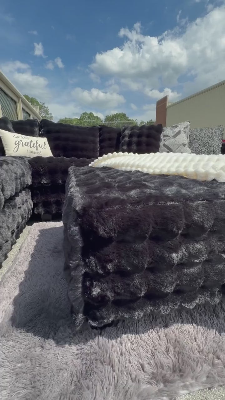 Black plush sectional