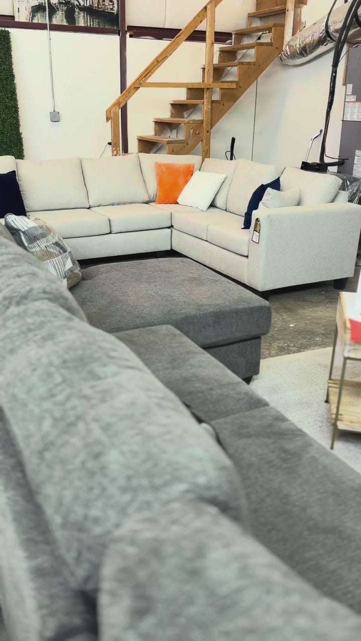 Grey and white sectionals in the showroom