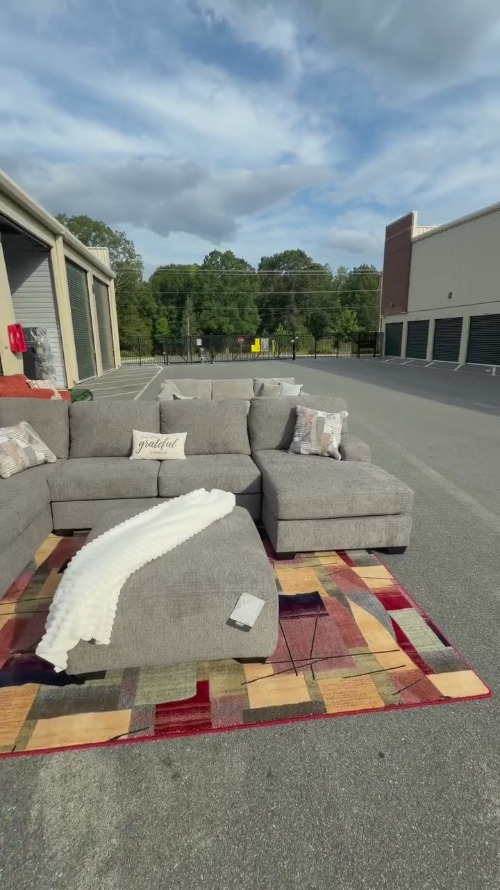 Taupe U-shaped sectional with ottoman