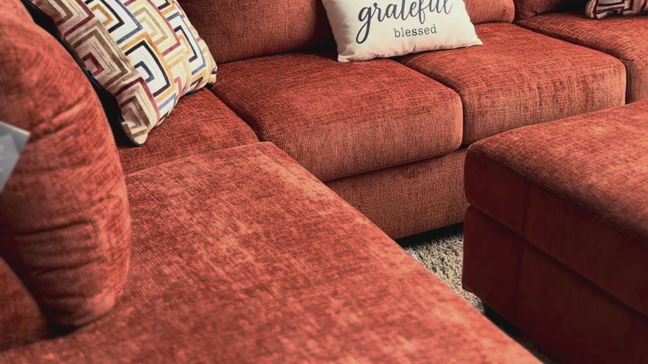 Burnt orange sectional chaise, close-up